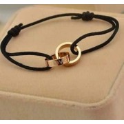 Cartier Double Ring Love Bracelet Yellow Gold Black Rope