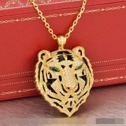 Panthere De Cartier Leopard Head Pendant In Yellow Gold With Emeralds And Diamonds
