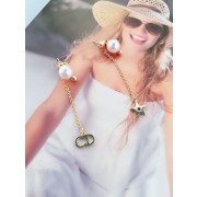 Dior La Petite Tribale CD Signature Star Detail White Pearl Womens Yellow Gold Asymmetric Drop Earrings E0672TRERS_D301