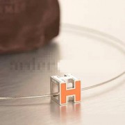 Hermes Cage dH Necklace Orange in Lacquer With Gold