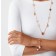 New Replica Van Cleef Arpels Lucky Spring Long Necklace Rose Gold Carnelian and Mother-of-pearl Onyx 15 Motifs